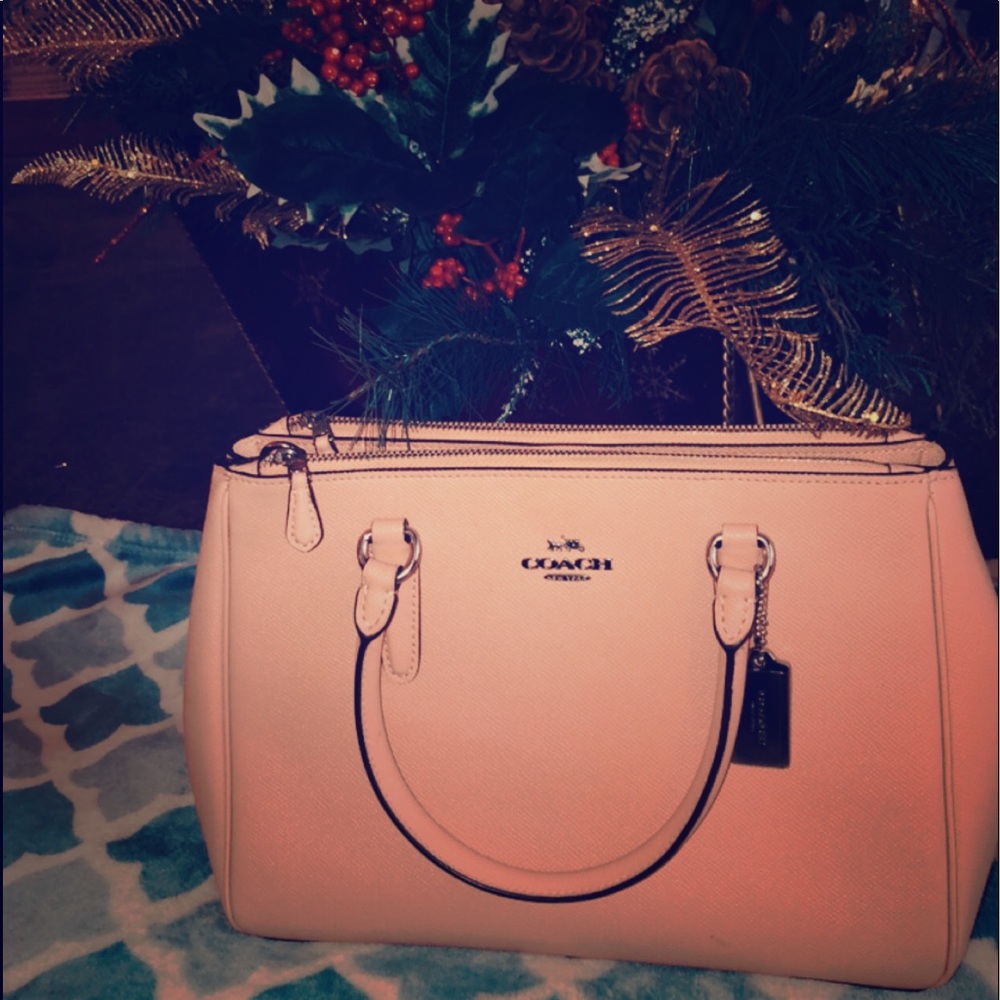Like new Coach pale pink purse